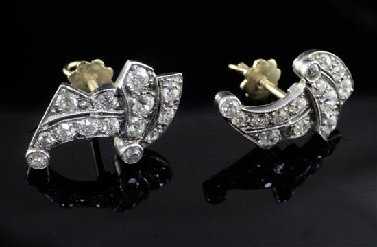 A pair of early 20th century white gold and diamond cluster ear studs,